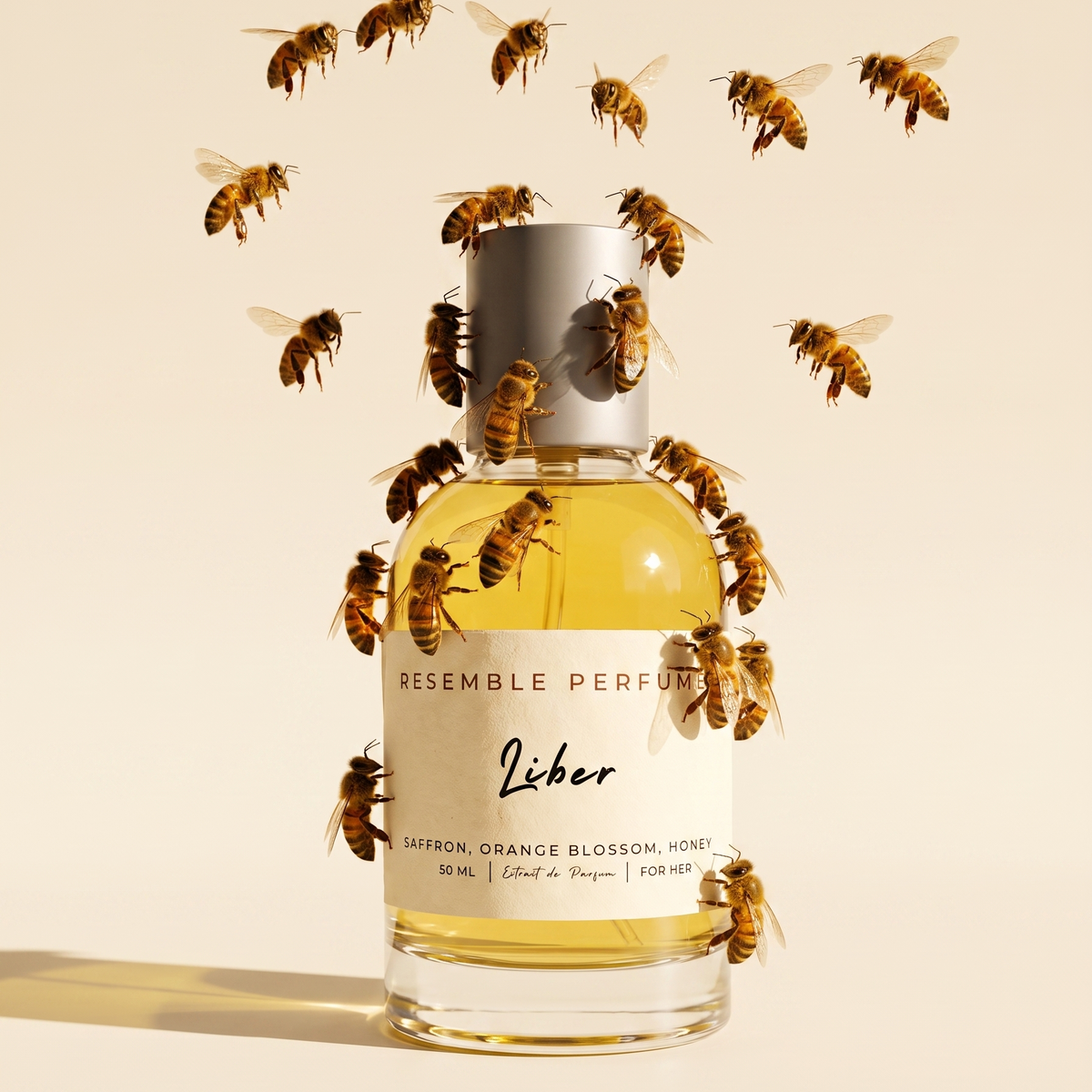 Liber extrait de parfum by Resemble Perfumes surrounded by honeybees on a warm honey background