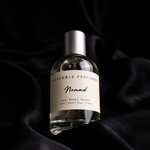 Nomad extrait de parfum by Resemble Perfumes on black silk